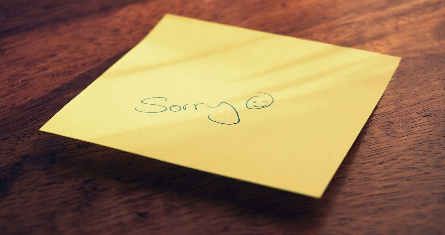 Husband writing emotional apology letter to his wife